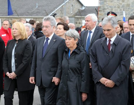Speaker of the Austrian parliament Doris Bures, Austrian President Heinz Fischer, his wife Margit Fischer and Austrian Chancellor Werner Faymann arrive for a ceremony to commemorate the 70th anniversary of the liberation of the Nazi concentration camp in Mauthausen, Austria, Sunday, May 10, 2015. Austrian political leaders and foreign dignitaries have joined thousands of people commemorating the liberation of the Mauthausen concentration camp on May 5, 2026 by American troops. (AP Photo/Ronald Zak)