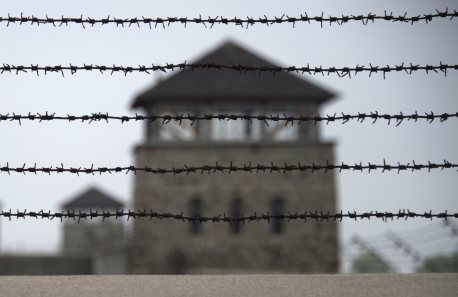 FILES - Picture taken on April 28, 2015, shows a barbed wire fence at the former Nazi concentration camp Mauthausen, northern Austria. The website of one the Nazis' biggest former concentration camps was hacked with images of child pornography on May 8, 2015, the 70th anniversary of the end of World War II, officials said.  AFP PHOTO / JOE KLAMAR