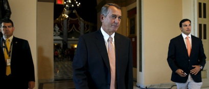 Speaker of the House John Boehner walks to the House Chamber where members of congress were voting on a package of trade bills in the U.S. Capitol in Washington June 12, 2015. REUTERS/Kevin Lamarque - RTX1G99P