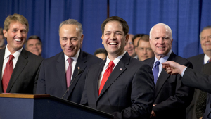 There are smiles all around as immigration reform legislation is outlined by the Senate's bipartisan "Gang of Eight", on Capitol Hill in Washington, Thursday, April 18, 2013. From left to right are Sen. Jeff Flake, R-Ariz., Sen. Chuck Schumer, D-N.Y., Sen. Marco Rubio, R-Fla., and Sen. John McCain, R-Ariz. The legislation would dramatically remake the U.S. immigration system, ushering in new visa programs for low- and high-skilled workers, requiring a tough new focus on border security, instituting a new requirement for all employers to check the legal status of their workers, and installing a path to citizenship for 11 million immigrants in the country illegally. (AP Photo/J. Scott Applewhite)