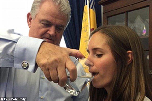 Helping hand: Brady shares the water with Colleen Carlos (above), his assistant 
