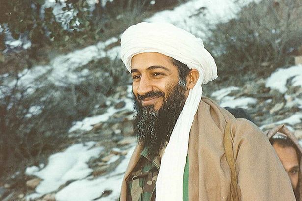 A smiling Osama Bin Laden