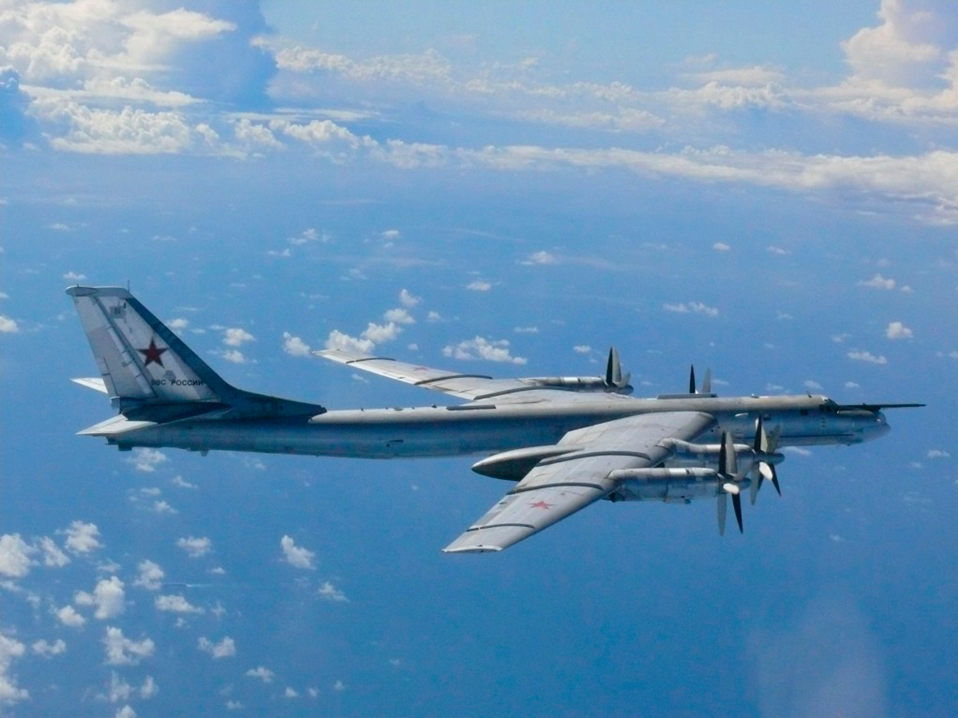 A Russian TU-95 bomber flies through airspace northwest of Okinoshima 